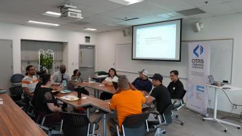 High school teachers and mentors participating in a roundtable discussion for a brainstorming session raising awareness about Chips and Science Act 