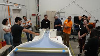 Grad student of Prof. Camli Badrya’s Davis Applied Aerodynamic Lab (DAAL) explain fluid dynamics to the participants