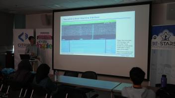 Prof. Weijian Yang presenting on Neuralink’s Brain Machine Interface