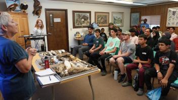 Students listening to mesmerizing presentation at the UC Davis California Raptor Center