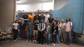Group photo of participants in the wind tunnel