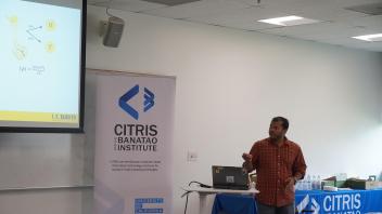 PhD candidate Pranta Saha presenting on The fascinating Quantum Era