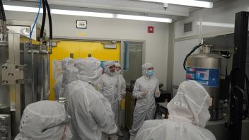 PhD Student Lisa Mcphillips demonstrating Electron beam assisted metal evaporation in CNM2