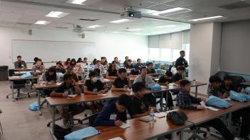 Students listening to presentation