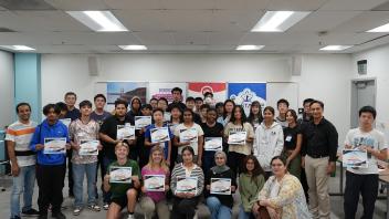 Group photo after completing the workshop, participants showcasing their certificates