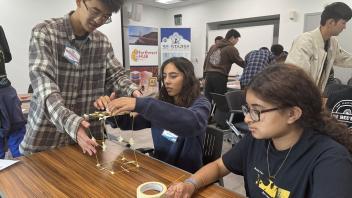 Students engaged in group problem solving